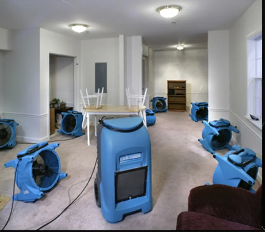 Air movers and dehumidifier setup for Water Extraction & Removal in Clinton